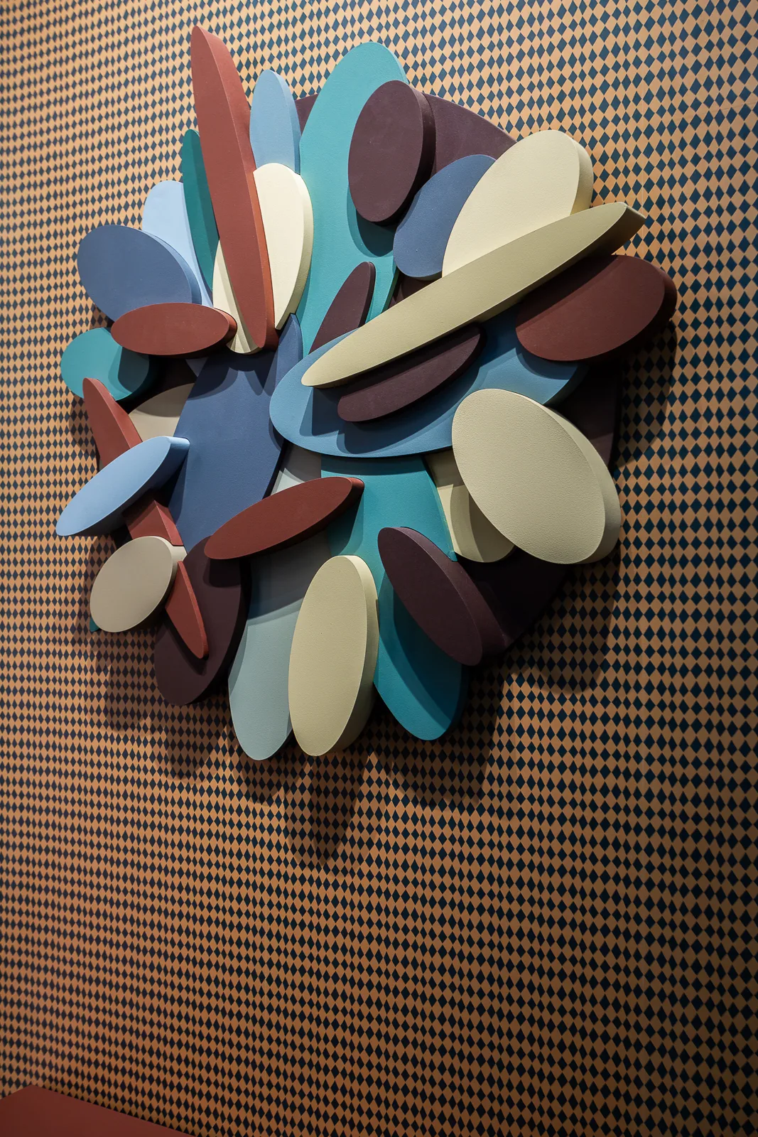 Sculptural arrangement of KANVA colour samples on the threaded display wall