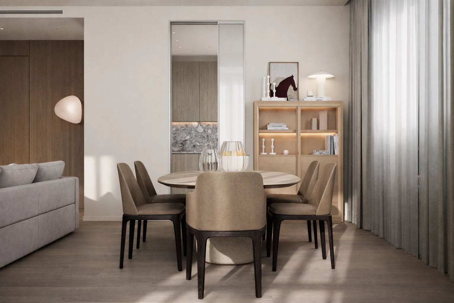 Dining group beside the open living room and timber kitchen volume