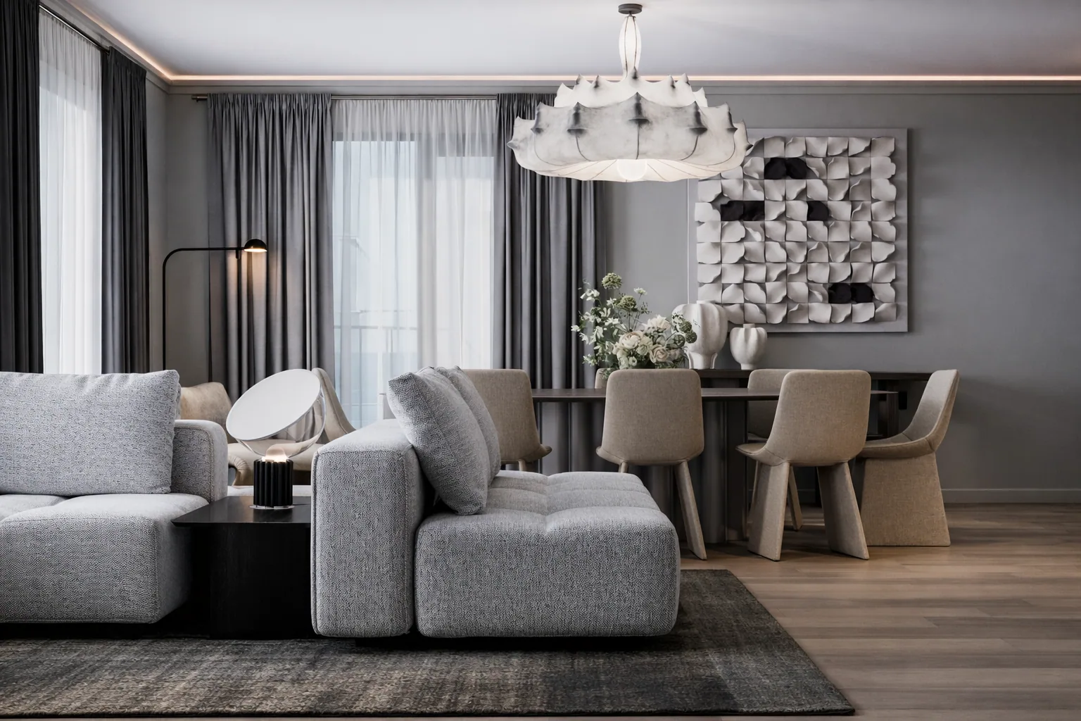 Soft modular sofa beside the dining group and abstract wall art
