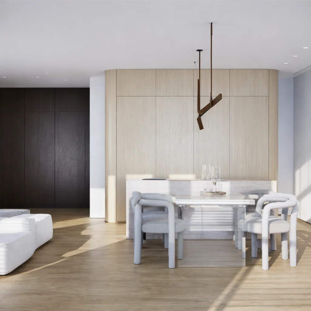 Pale timber kitchen volume and dining group in the open living area