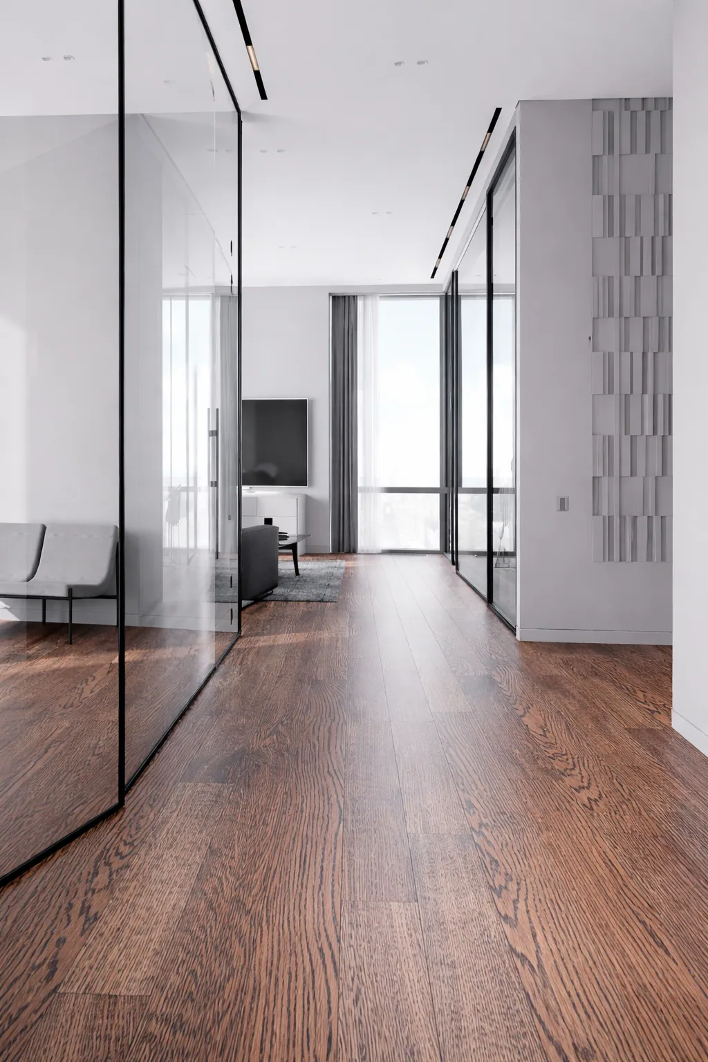 Long perspective through the Mosfilm apartment with timber flooring and glass walls