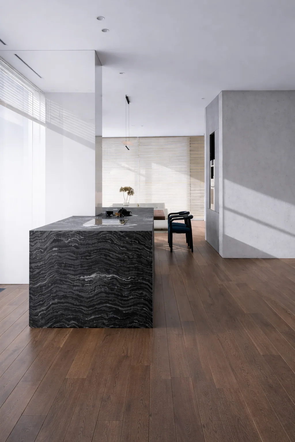 Open-plan Kamerton apartment with a dark stone kitchen island and panoramic windows